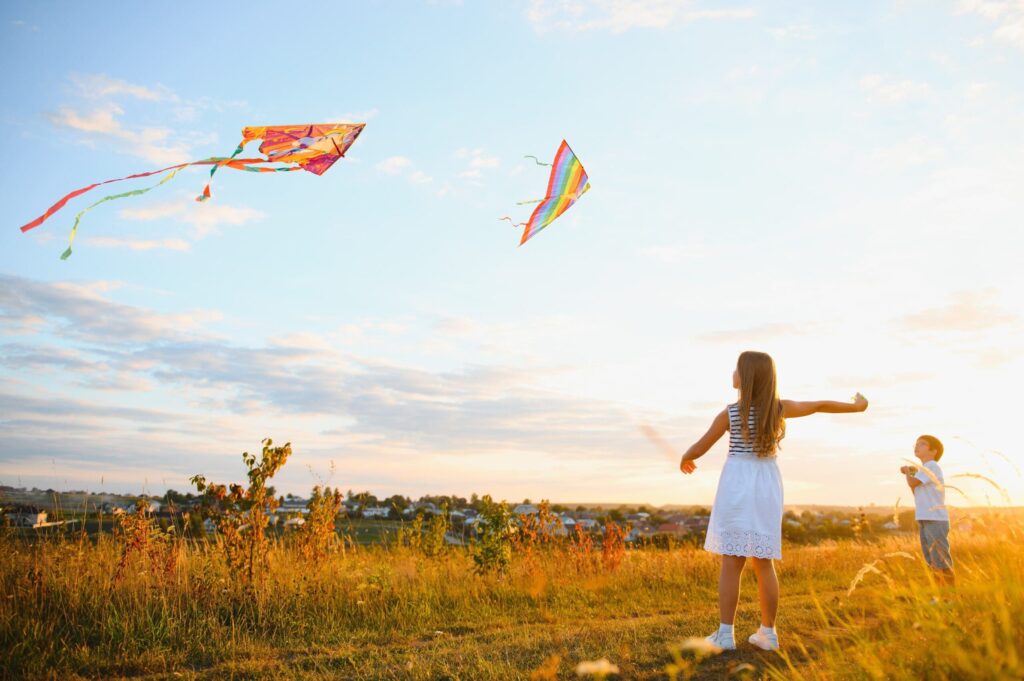 kids playing with kites